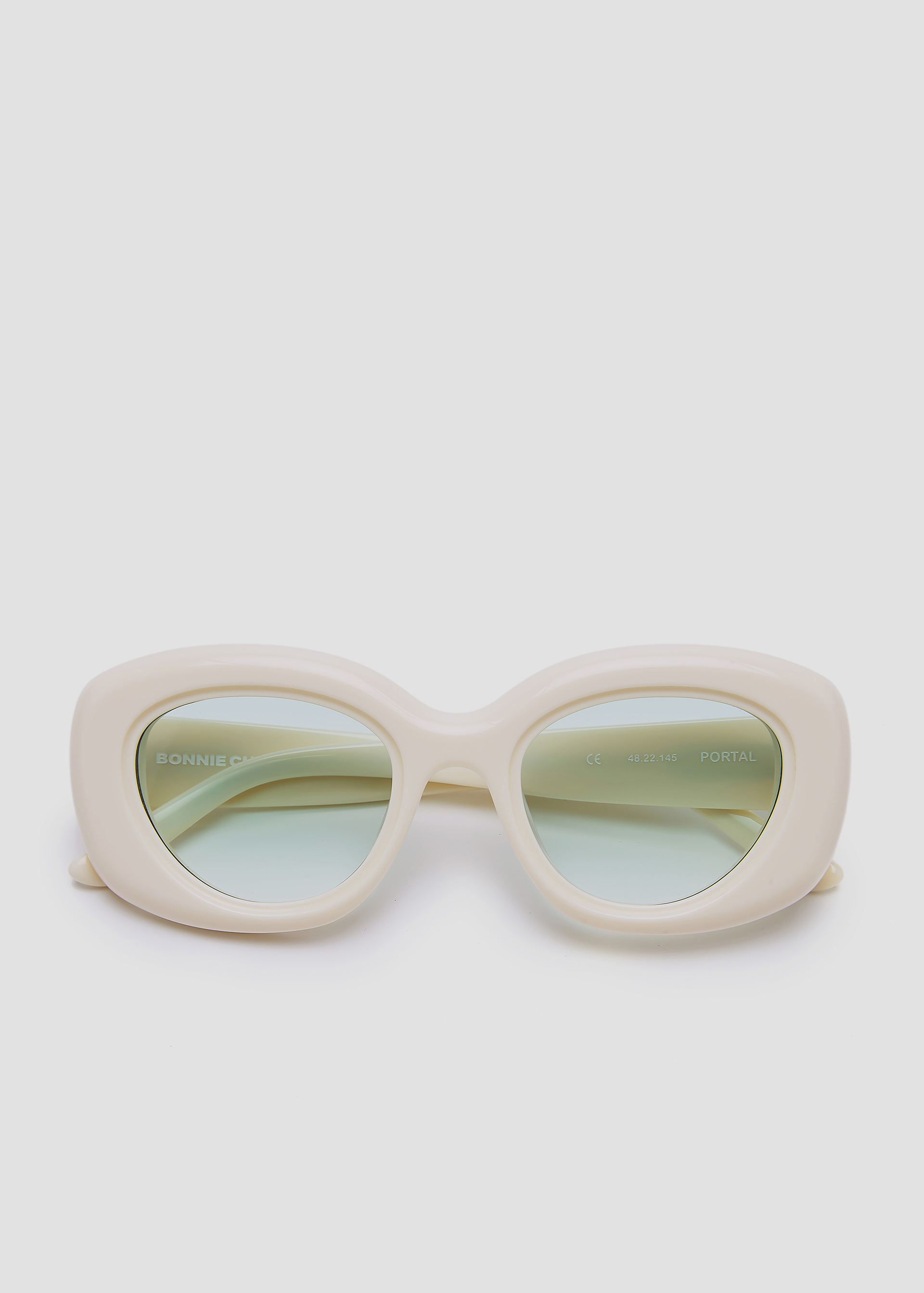 off white sunglasses on face
