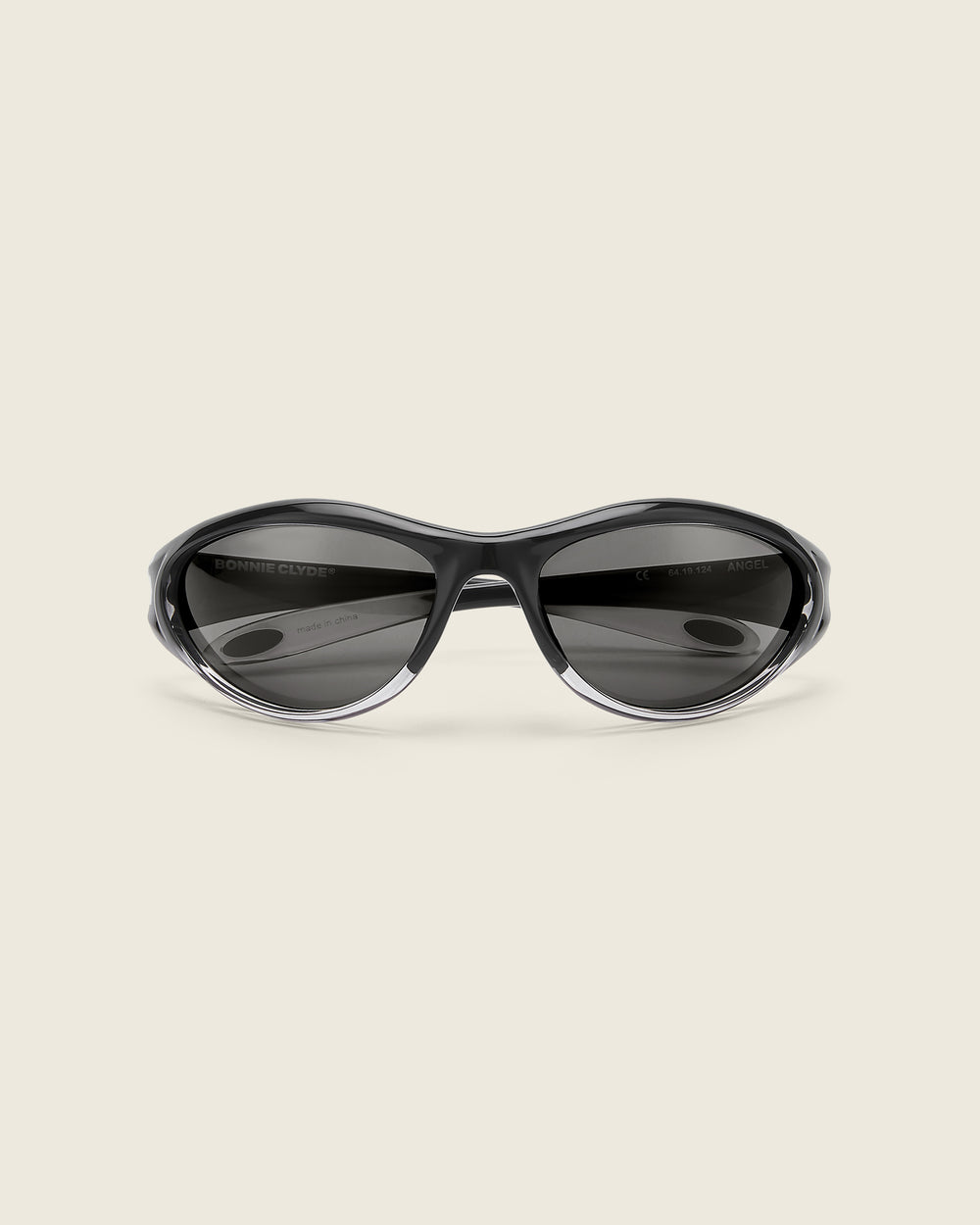 Bonnie Clyde Angel black curved TR90 sunglasses with black lenses, face view.