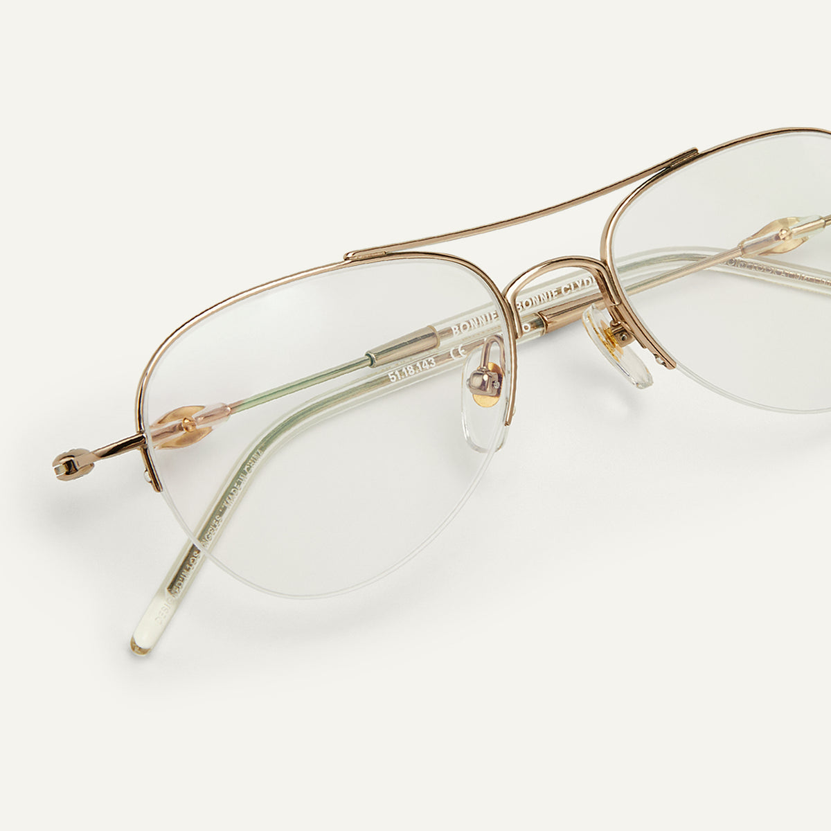 KOMONO Bonnie Clear/Gold Sunglasses (NEW) Bonnie Clyde | Lucky Star Optical | Gold Tortoise Rimless  main image 3
