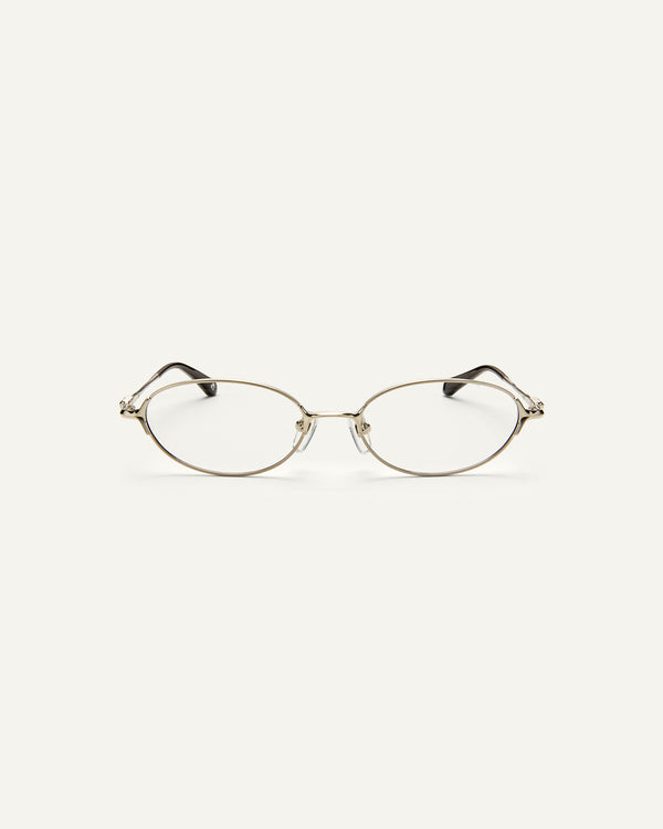 Face shot of Bonnie Clyde Bunny eyeglasses in titanium silver with brown acetate and clear lenses. 