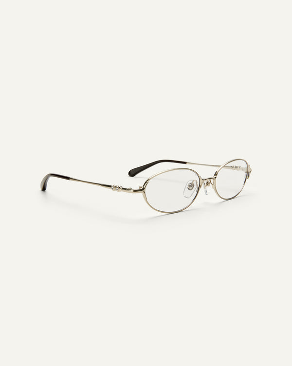 Quarter shot of Bonnie Clyde Bunny eyeglasses in titanium silver with brown acetate and clear lenses. 