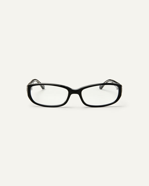 Face shot of Bonnie Clyde Triplet eyeglasses in black frames with clear lenses.